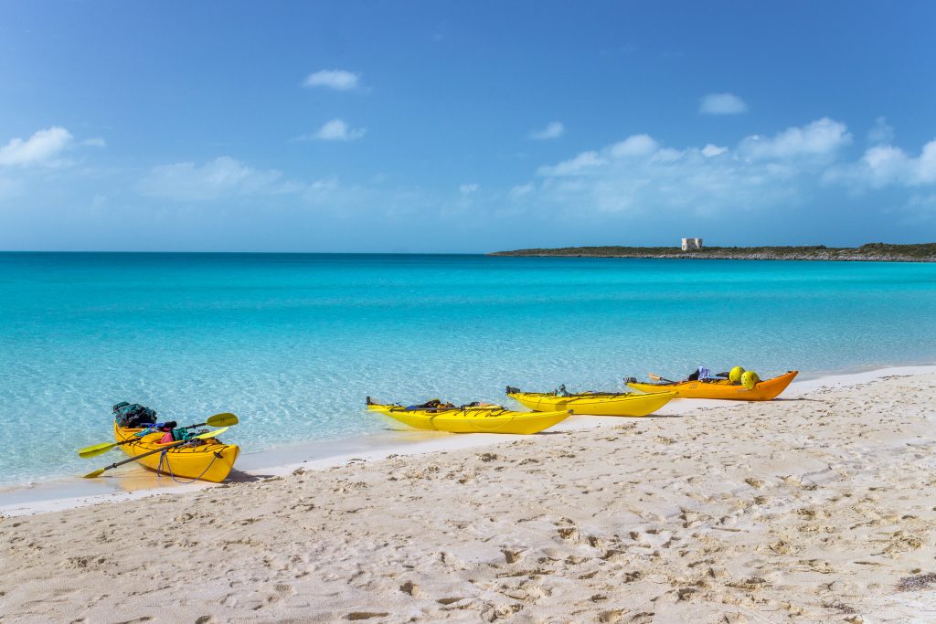 Kayaks on a beach in the Bahama Islands